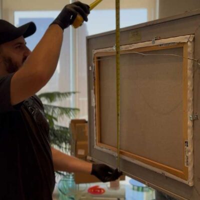 Art restoration service by The Art Guys showcasing ethical care for fire and water-damaged possessions in Dallas.